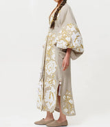 Beige kaftan with gold embroidery